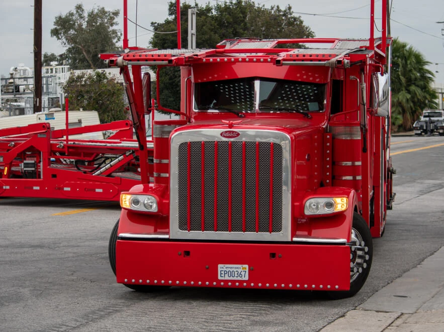 Open Carrier Truck With Several Cars